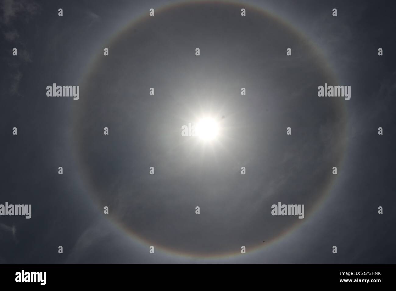 Sun halo or known as solar halo found in India in the noontime with a beautiful rings pattern around the sun Stock Photo