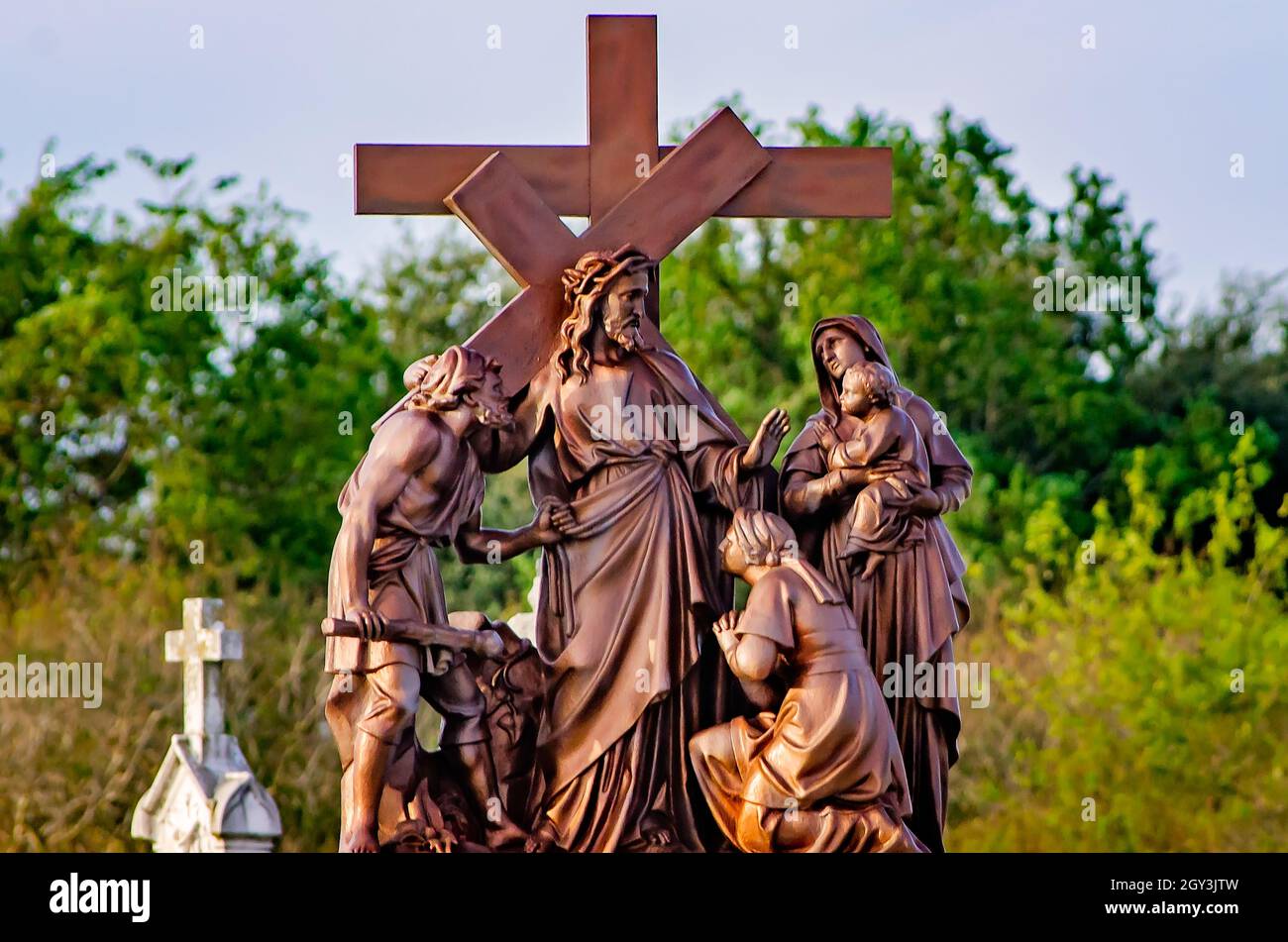 A statue of the Eighth Station of the Cross, Jesus meets the women of Jerusalem, stands at the entrance to St. Patrick Cemetery No. 2 in New Orleans. Stock Photo