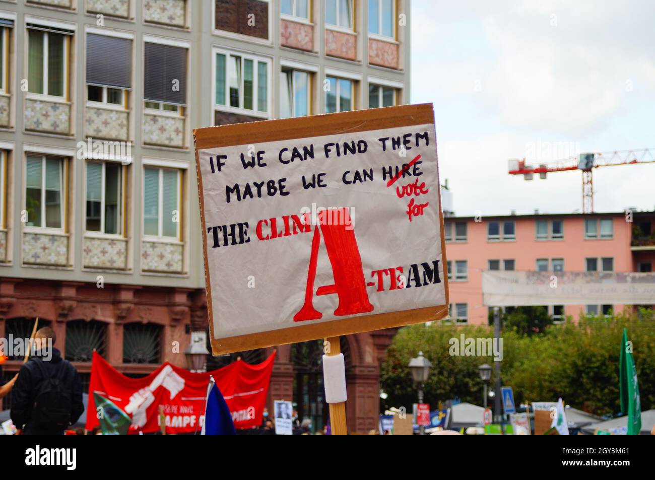 FRANKFURT, GERMANY - Sep 24, 2021: Humorous protest sign at a Fridays for  Future demonstration in Frankfurt: Maybe we can hire the CLIM- A-TEam. Play  Stock Photo - Alamy