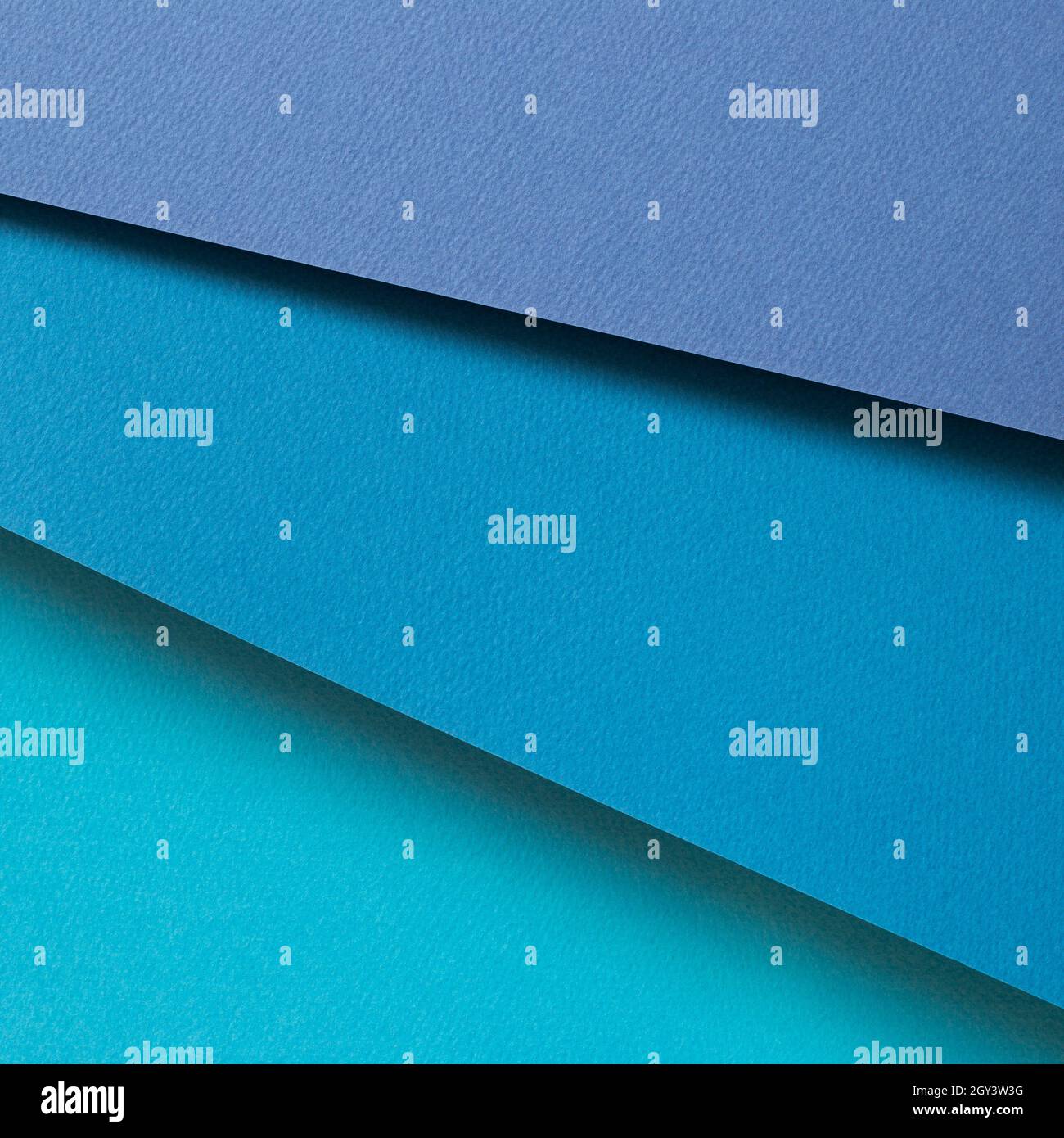 Abstract blue layered color paper background Stock Photo Alamy