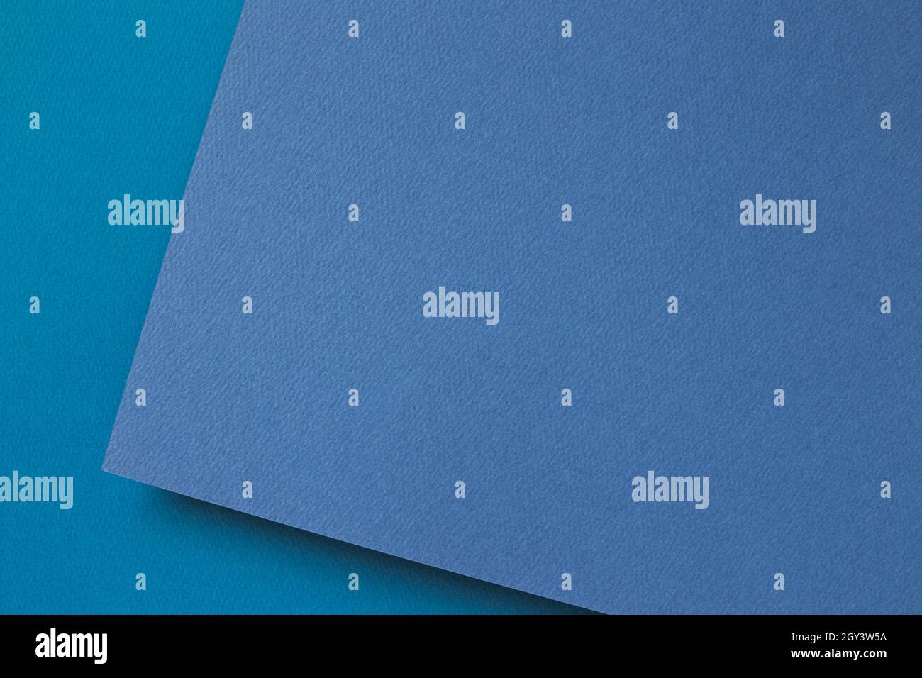 Abstract blue layered color paper background Stock Photo