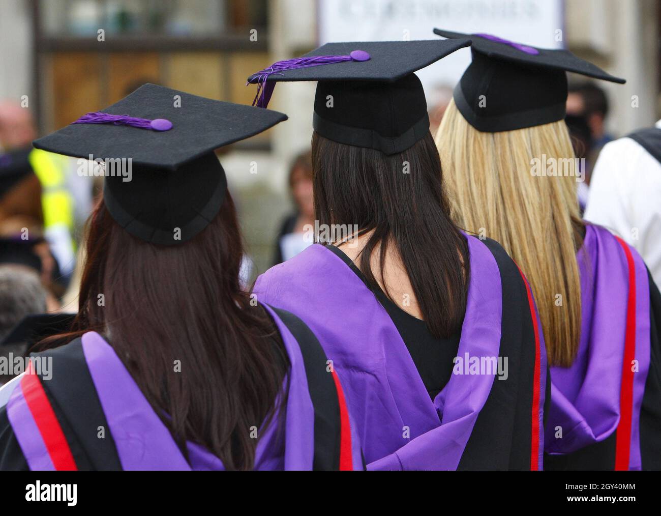 File photo dated 16/07/08 of university graduates. England's higher education watchdog has warned, universities should not disregard poor spelling, punctuation and grammar when marking exams and assessments as it could lead to inflated grades. Stock Photo