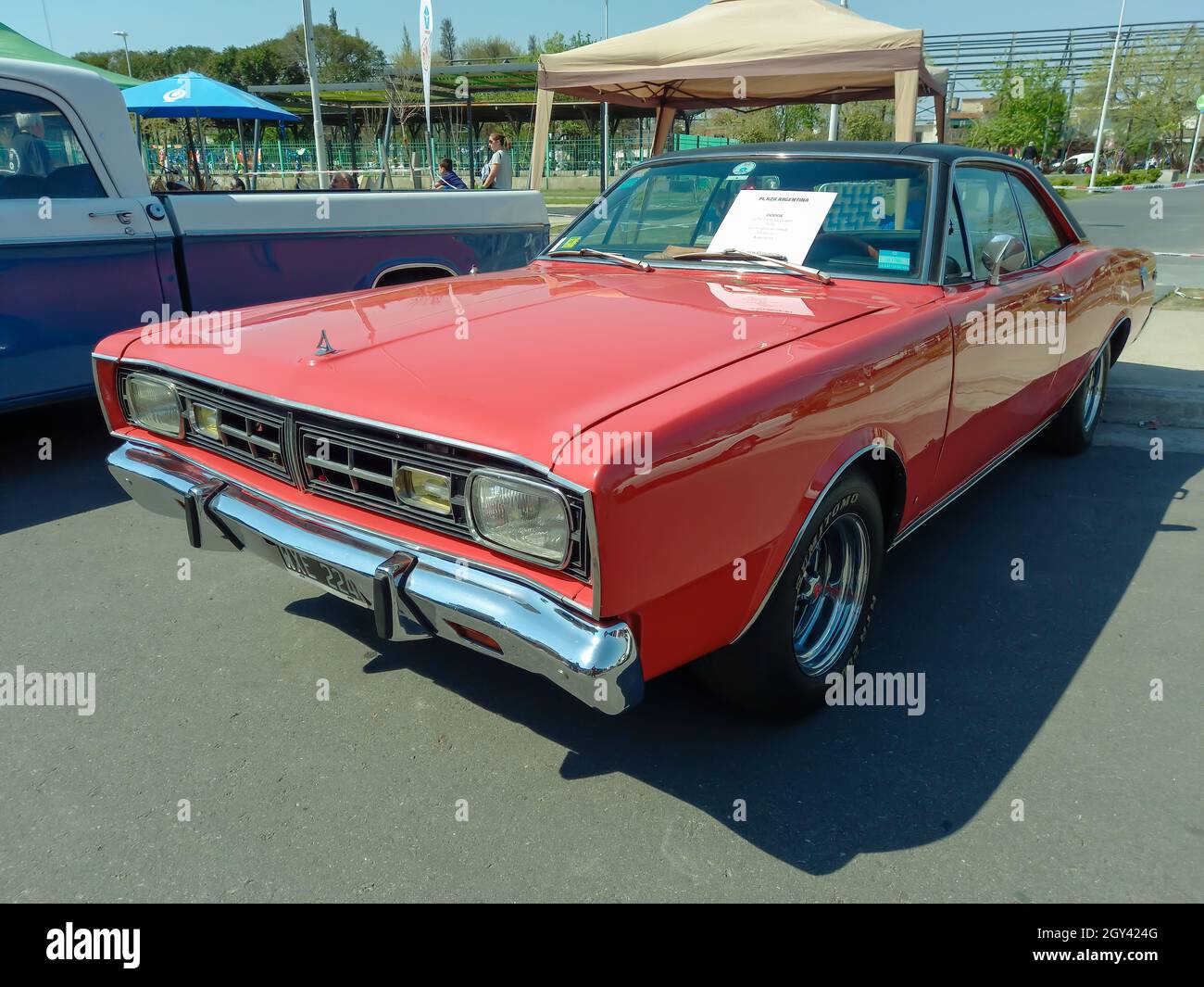 AVELLANEDA - ARGENTINA, ARGENTINA - Sep 27, 2021: Dodge GTX Slant Six Power 1970 classic 2 door red convertible coupe. Sporty muscle car manufactured Stock Photo