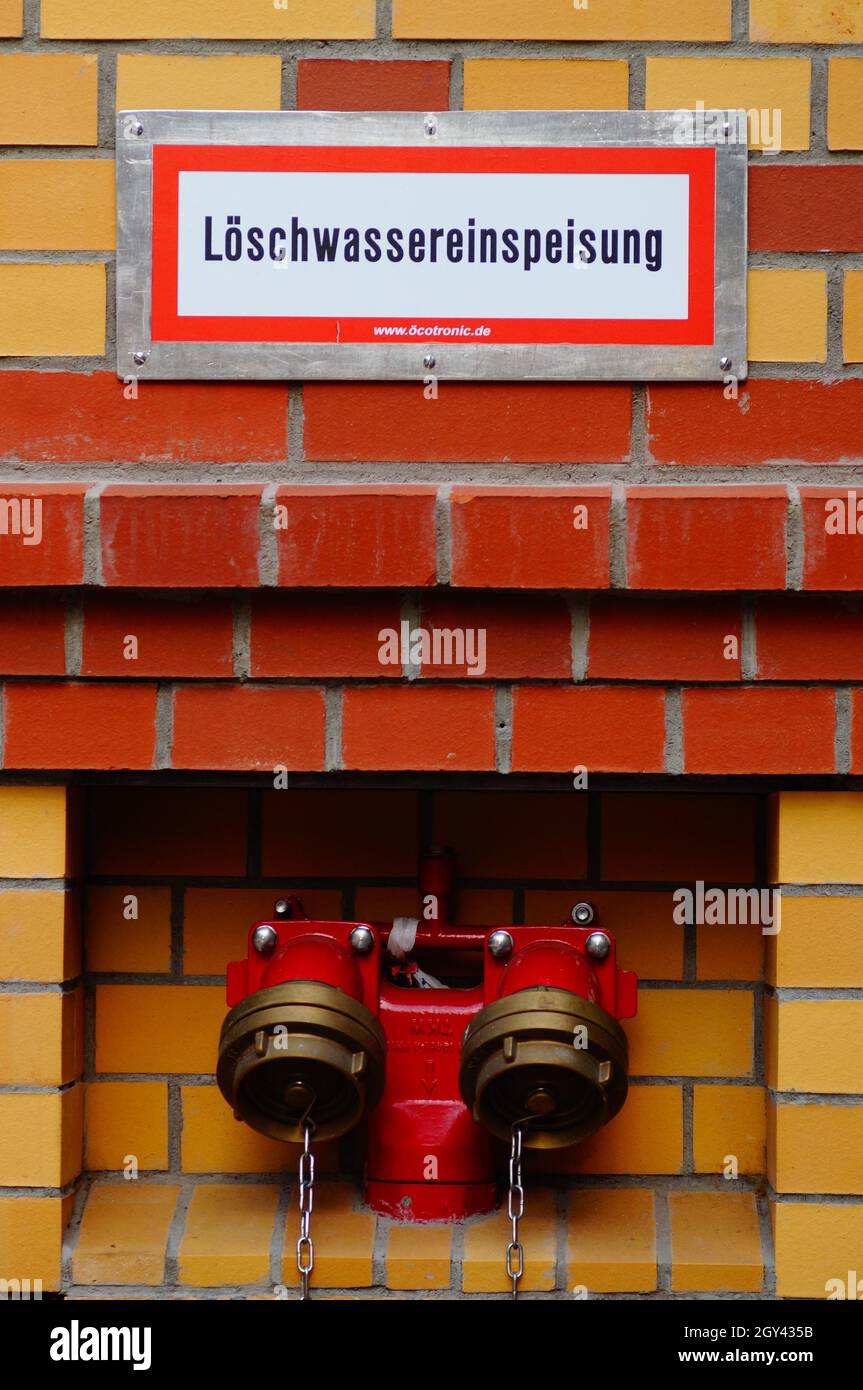 Feeding point of a riser for the fire brigade at a building Stock Photo ...