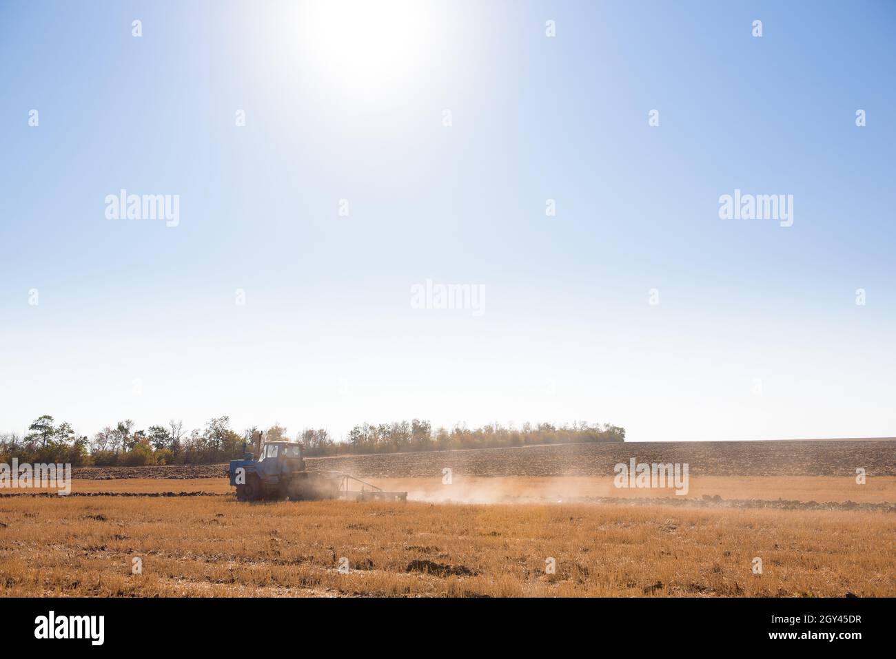 Farming Before Spring Farmer preparing his field in a tractor ready for spring Stock Photo ...