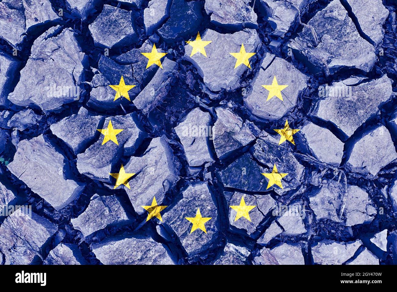 Grunge EU flag isolated on dry cracked ground background Stock Photo