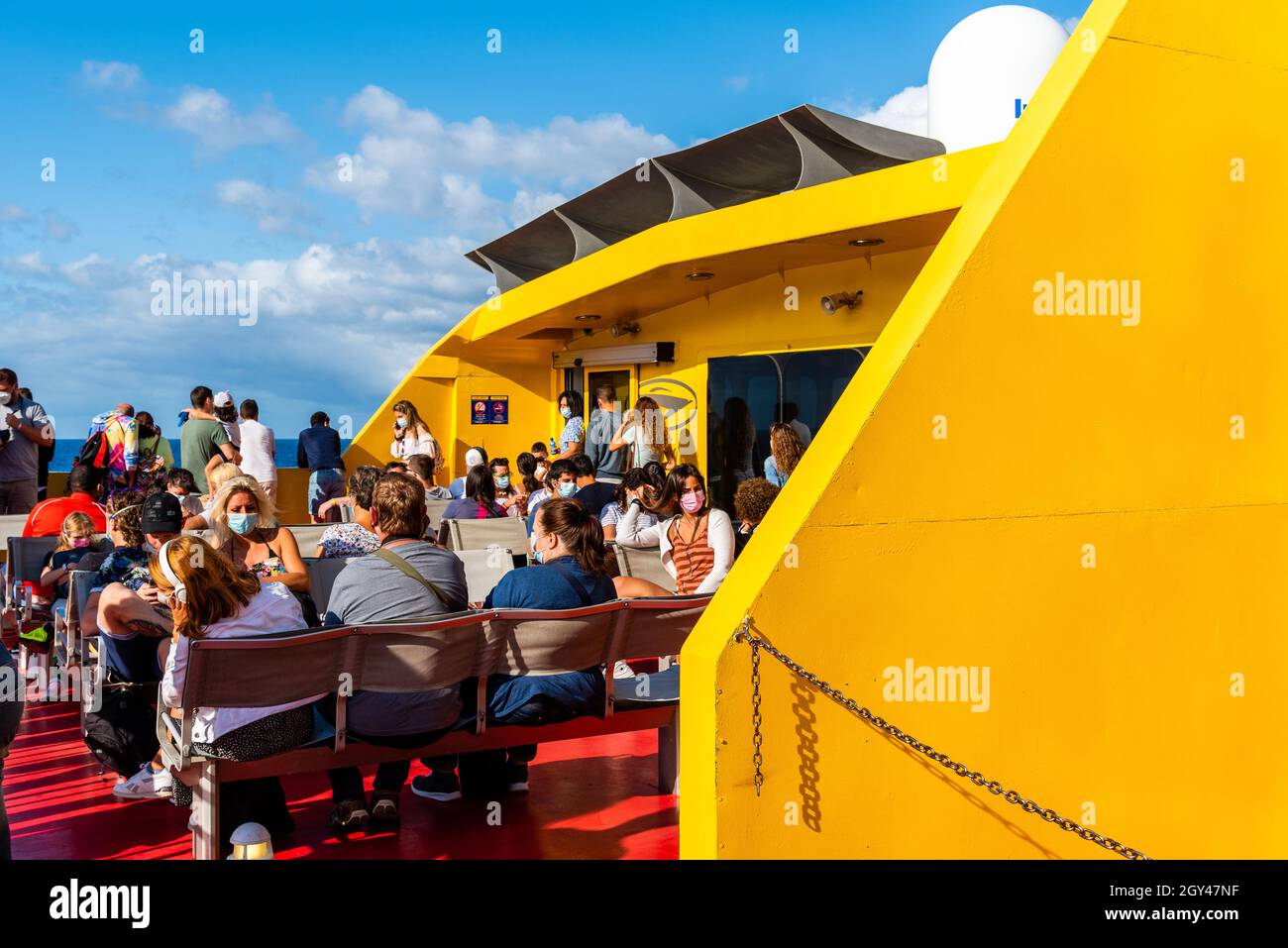 Los Cristianos, Spain August 9, 2021 Passengers wearing face masks
