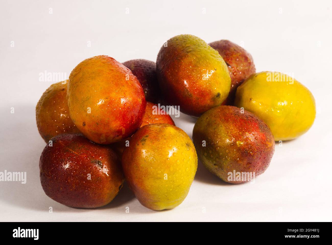 Jocotes in Guatemala, tropical fruit, Spondias purpurea Stock Photo - Alamy