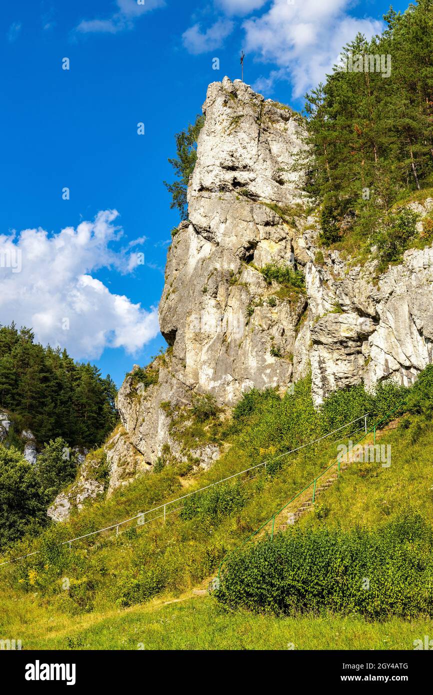 Grupa Zabiego Konia limestone rock massif with Zabi Kon rock in Kobylanska Valley within Jura Krakowsko-Czestochowska upland near Cracow in Poland Stock Photo