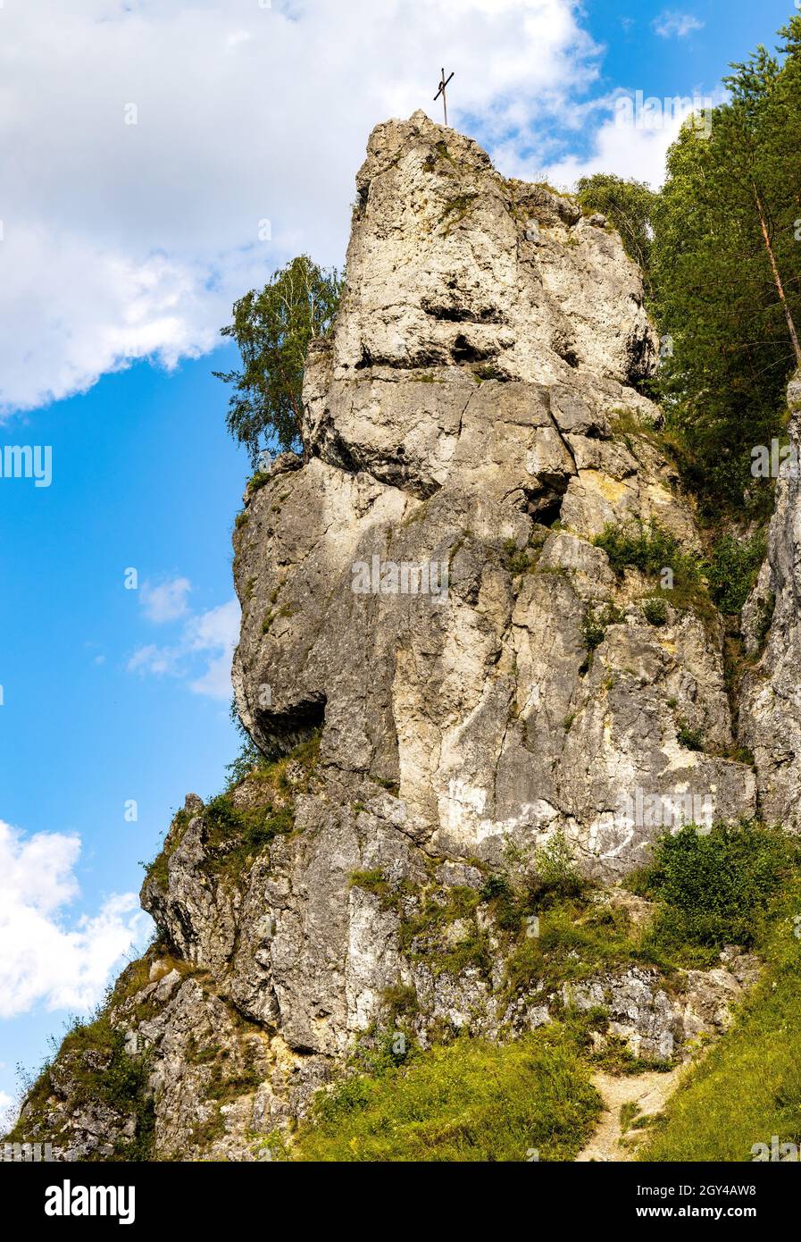 Grupa Zabiego Konia limestone rock massif with Zabi Kon rock in Kobylanska Valley within Jura Krakowsko-Czestochowska upland near Cracow in Poland Stock Photo