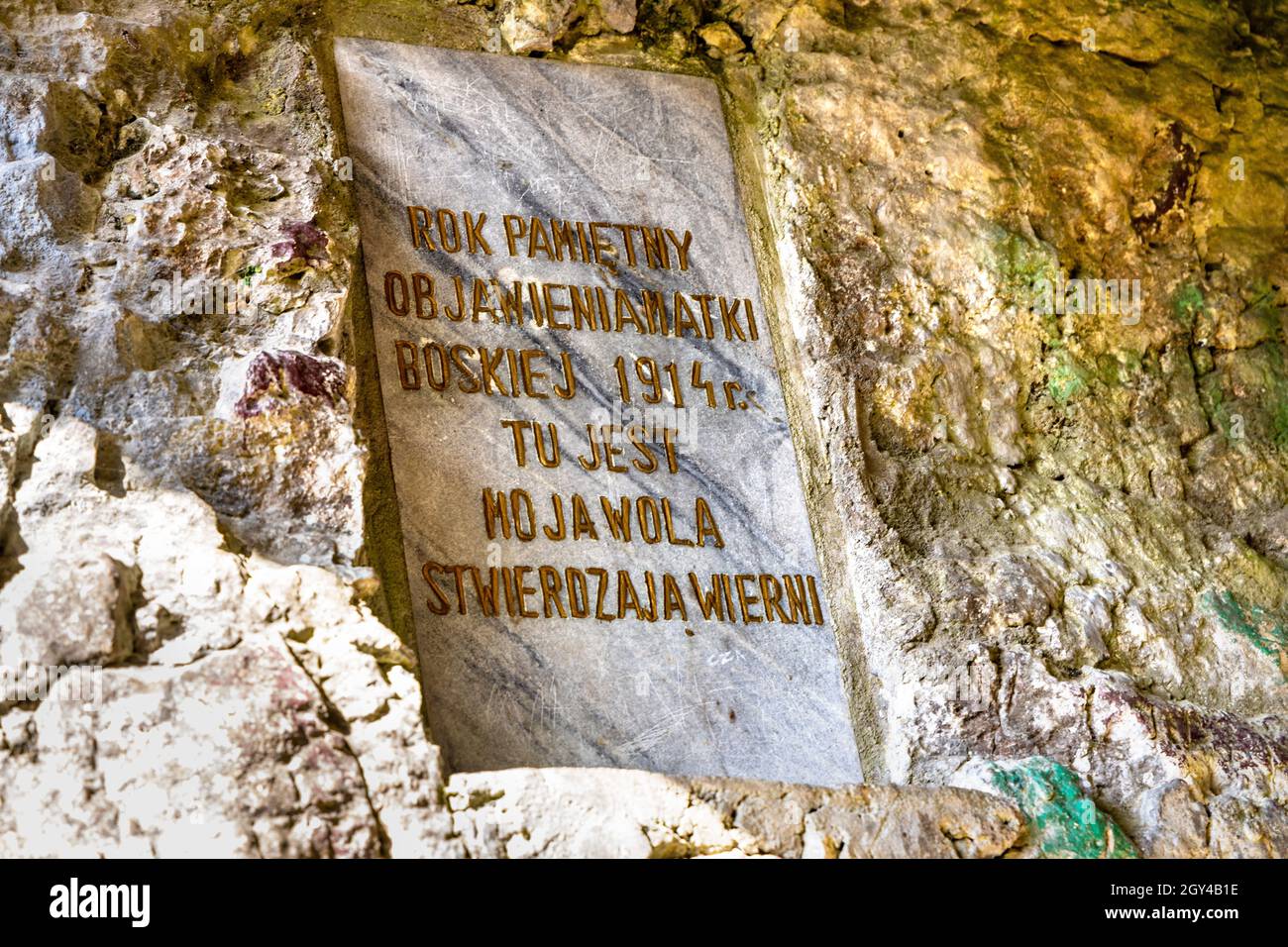 Cracow, Poland - August 26, 2020: Holy Mary cave shrine aside Zabi Kon and Mnich rock in Jurassic Kobylanska Valley near Cracow in Lesser Poland Stock Photo