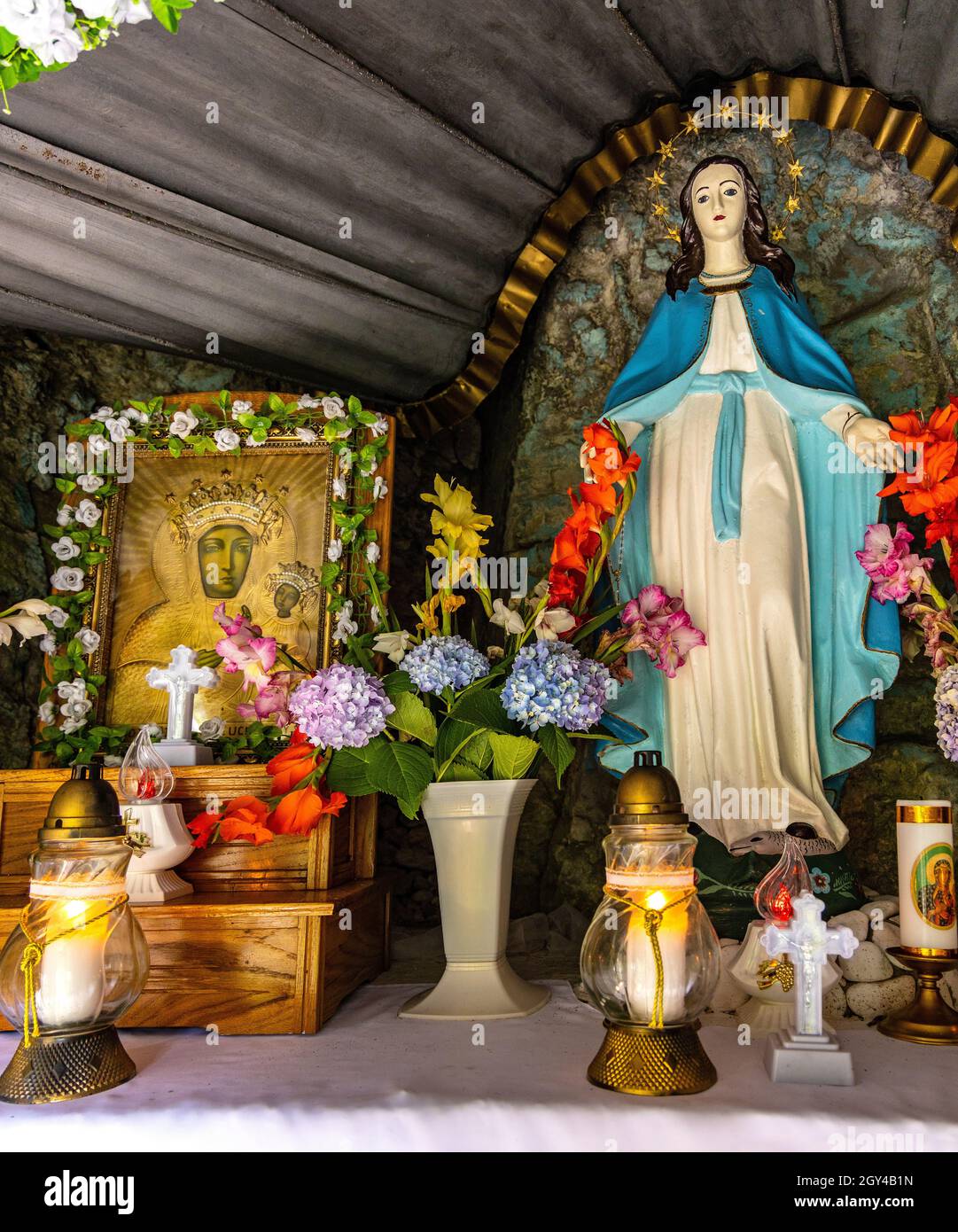 Cracow, Poland - August 26, 2020: Holy Mary cave shrine aside Zabi Kon and Mnich rock in Jurassic Kobylanska Valley near Cracow in Lesser Poland Stock Photo