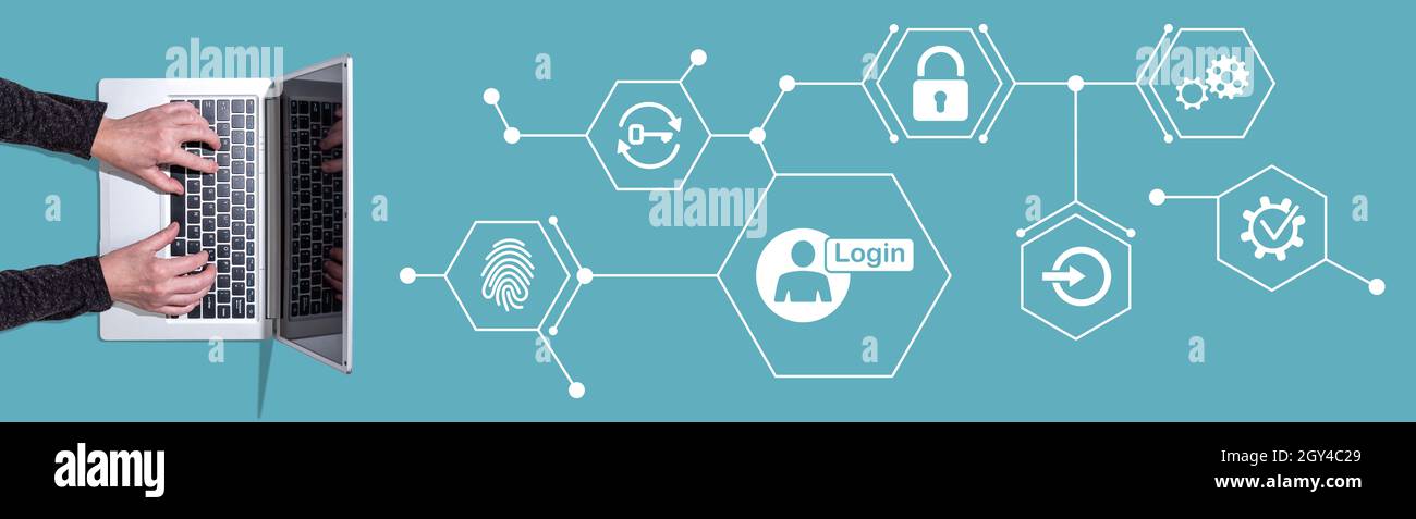 Top view of hands using laptop with symbol of login concept Stock Photo ...