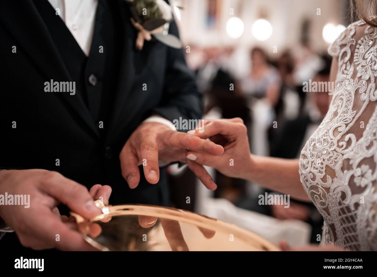 Hands,  picture of man and woman with wedding ring, church wedding  ceremony,love Stock Photo
