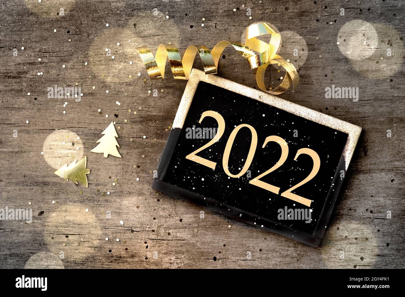 Christmas 2022 Signs New Year 2022 Written On Little Sign On Christmas Decoration On Wooden  Background Stock Photo - Alamy