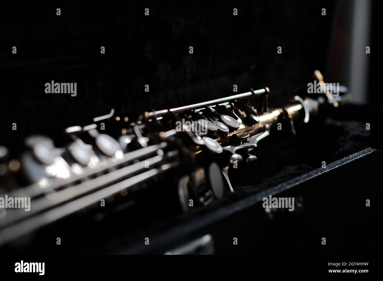 Closeup shot of saxophone buttons in a dark room Stock Photo Alamy