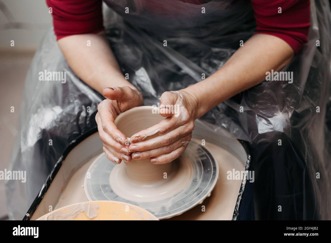 Best Kinda Therapy Unrecognizable Woman Molding Clay Pottery Wheel Stock  Photo by ©PeopleImages.com 657966250