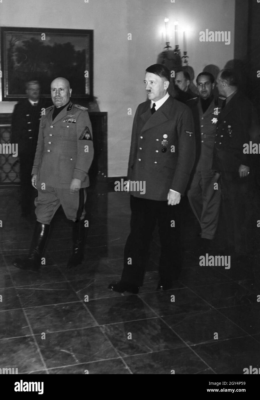Hitler and Mussolini at a meeting in Salzburg. In the back, Count Ciano and von Ribbentrop. [automated translation] Stock Photo
