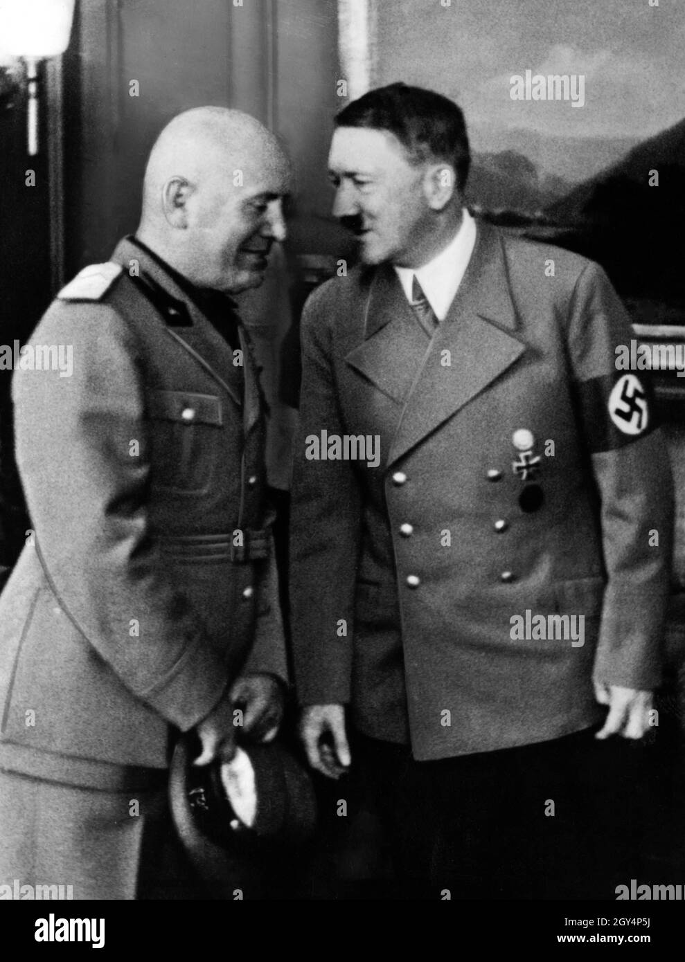 Adolf Hitler in conversation with Italian fascist dictator Benito  Mussolini. [automated translation] Stock Photo - Alamy