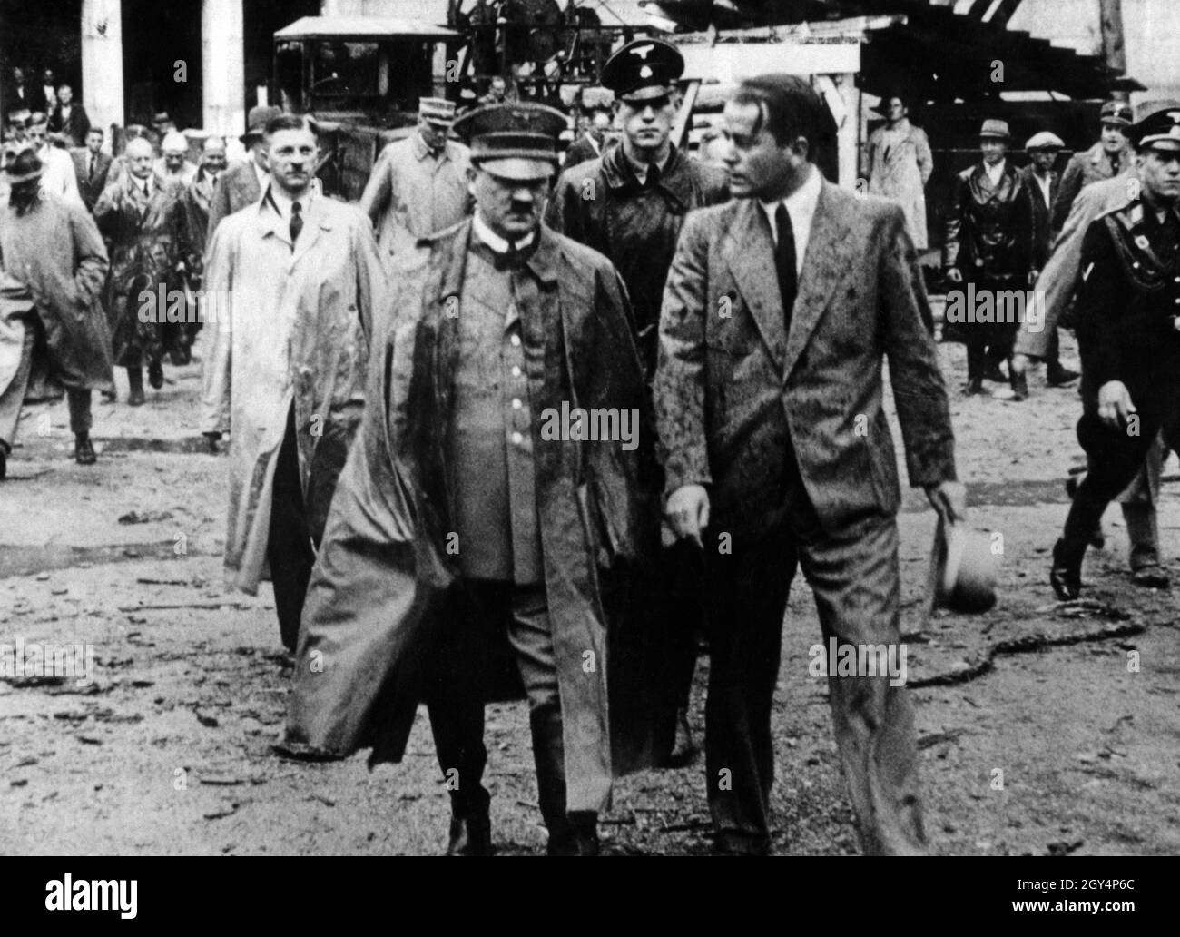 Adolf Hitler inspects the progress of the buildings on the Nazi Party Rally Grounds in Nuremberg with the architect in charge, Albert Speer. [automated translation] Stock Photo