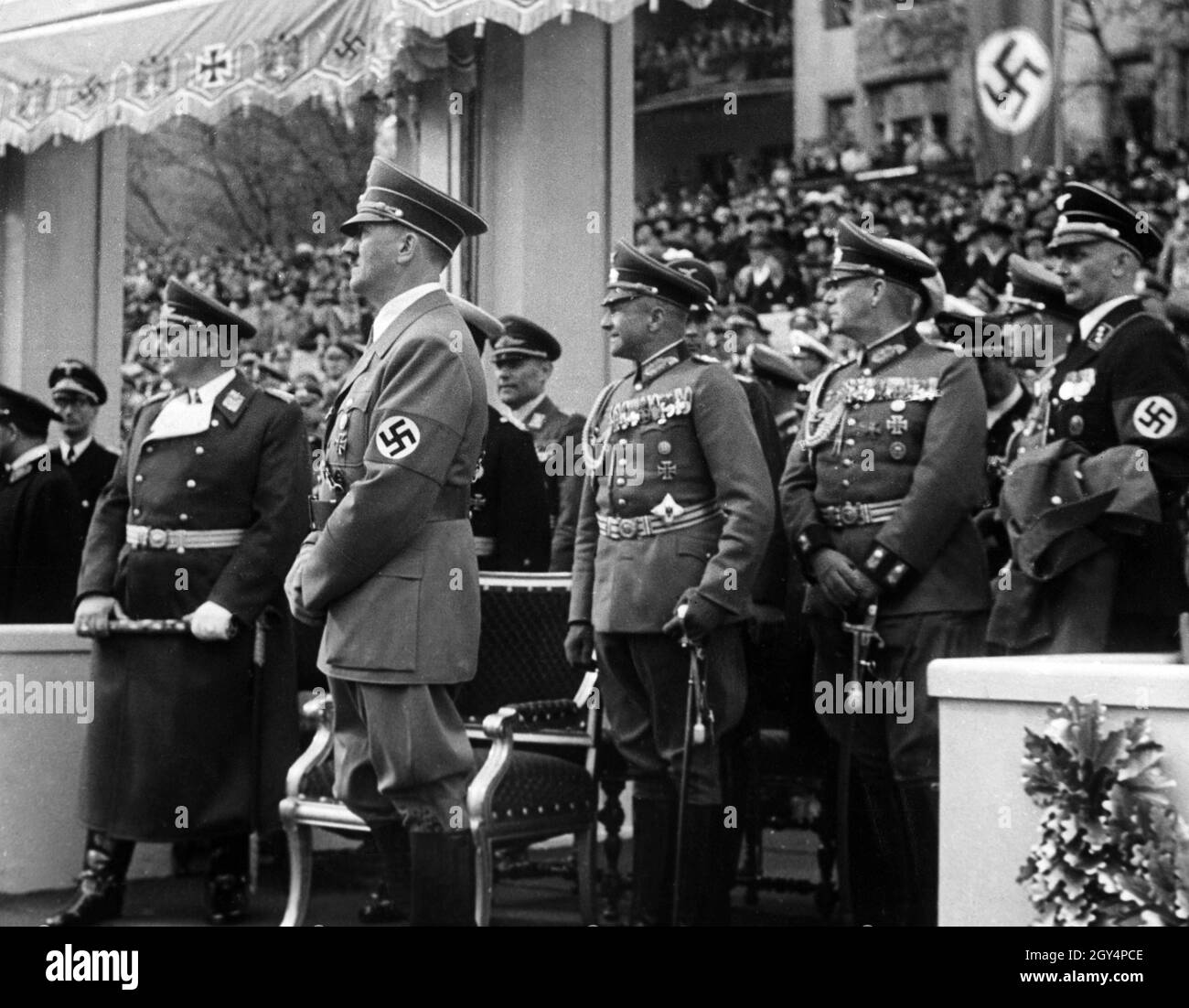 In the year of the outbreak of World War II, Adolf Hitler's birthday was celebrated with the largest military parade in German history. Behind Hitler are Hermann Göring, Erich Raeder (obscured), Walther von Brauchitsch and Wilhelm Keitel. [automated translation] Stock Photo
