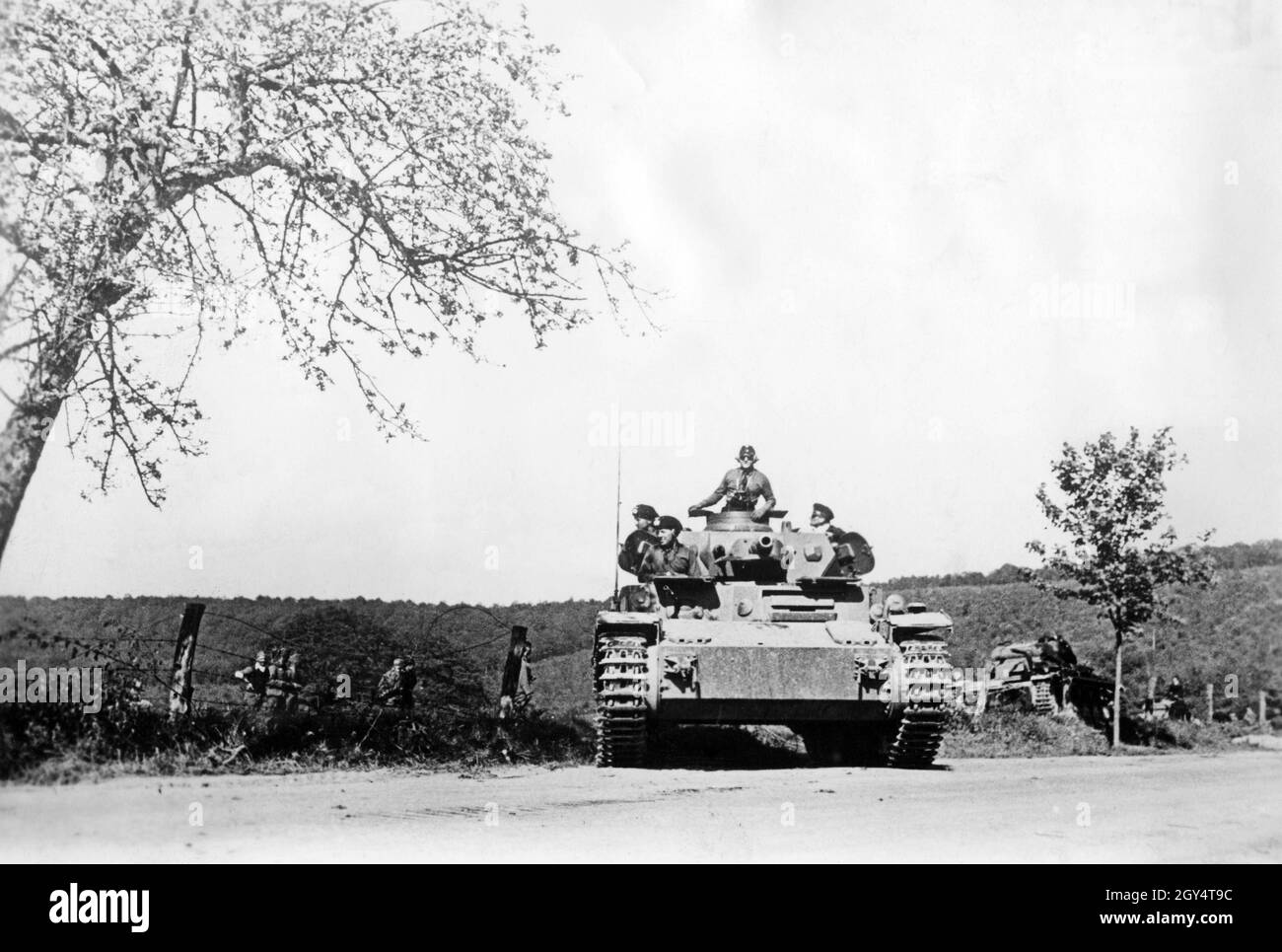 French campaign in the Second World War: German armoured car on a road on the banks of the Meuse. [automated translation] Stock Photo