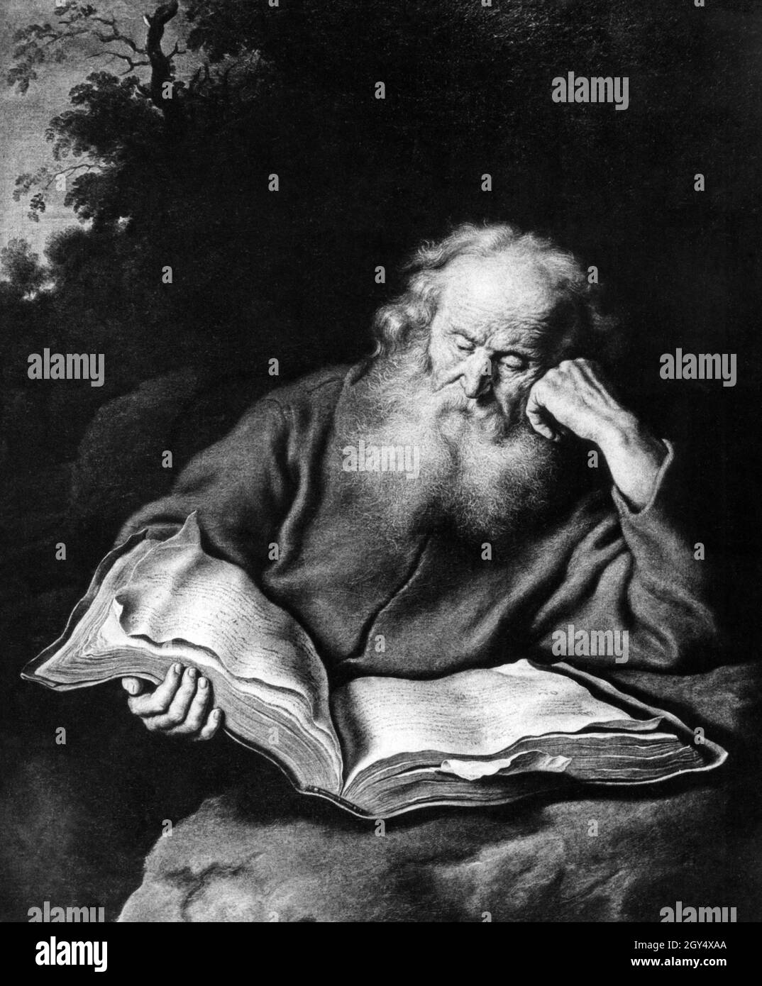 Depiction of a hermit after a painting by Salomon Koninck. He is reading  the Bible. Undated photograph. Salomon Koninck lived in Amsterdam from 1609  to 1656. [automated translation] Stock Photo - Alamy