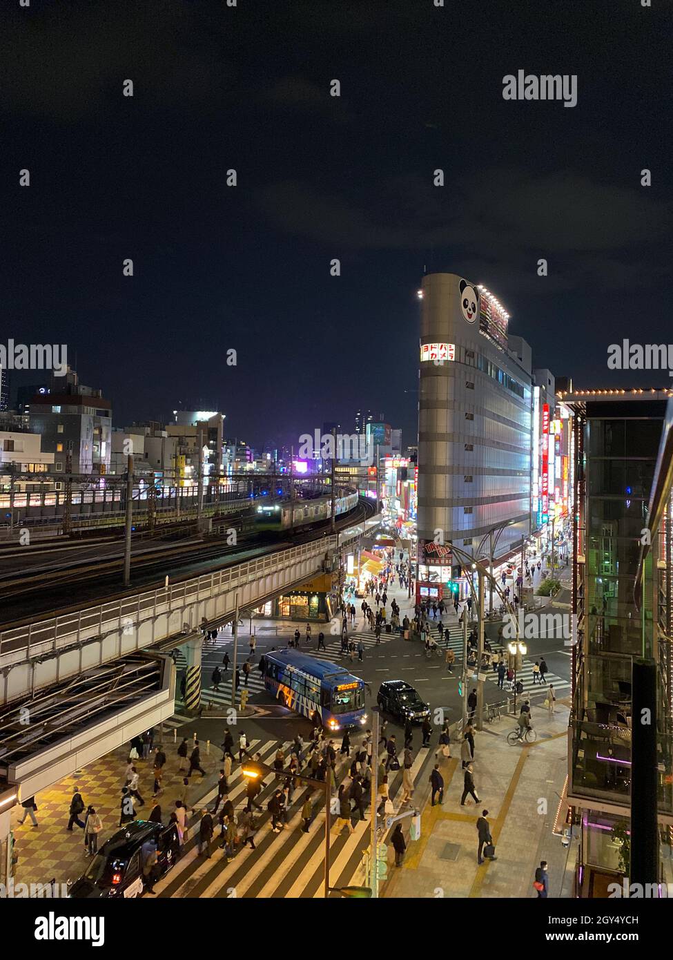 Tokyo, Japan - 18 November 2019: High angle night view of the Ueno Park street leading to the intersection of the Central Street and Ameyoko Street in Stock Photo
