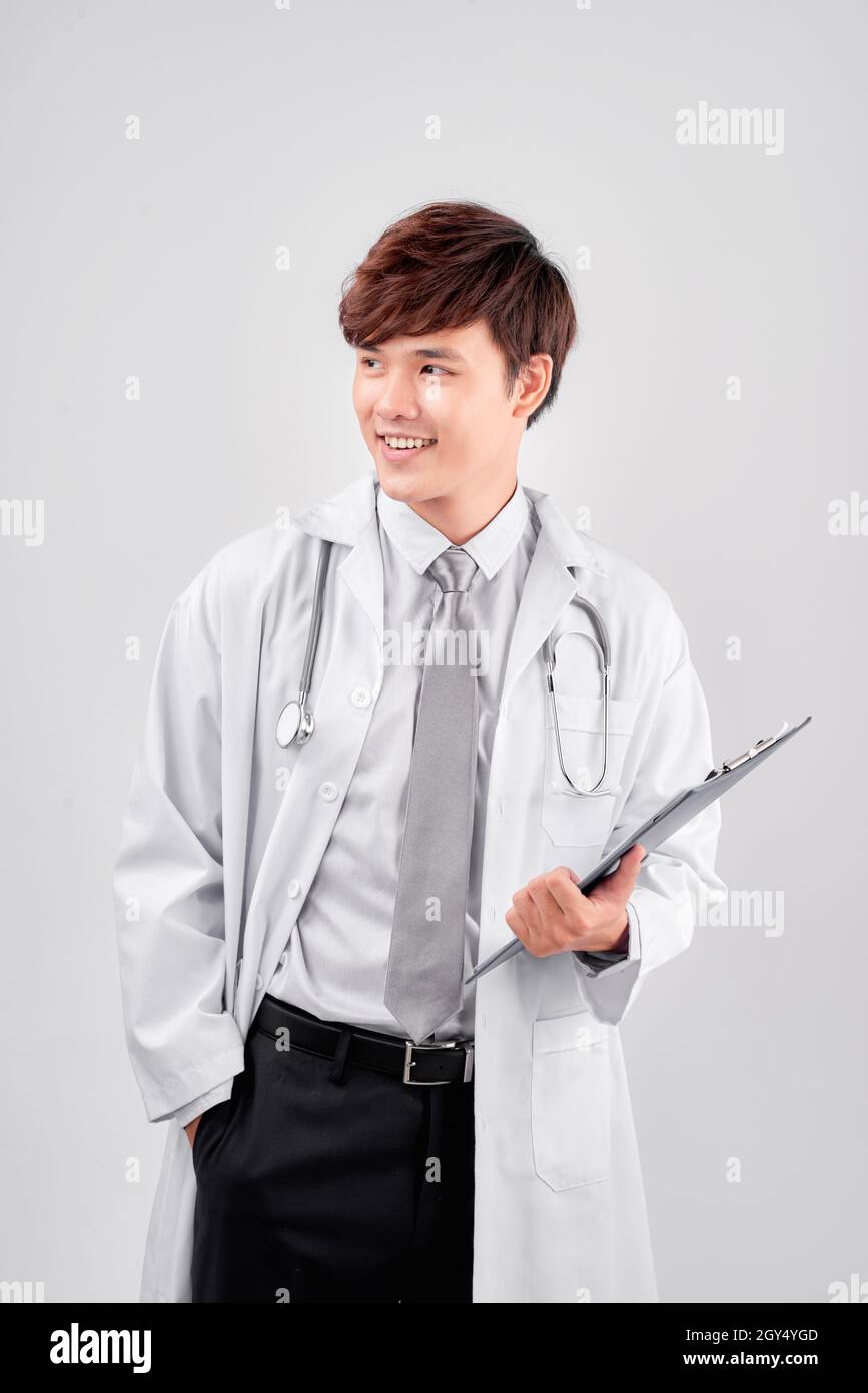 Male doctor standing folder on hi-res stock photography and images - Alamy