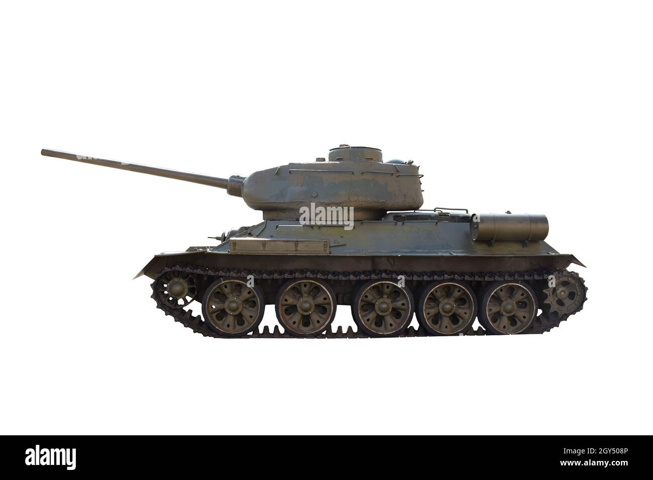 A Soviet T-34 tank stands sideways in the bright sun on a clean white background with clipping. Photographed from the side Stock Photo