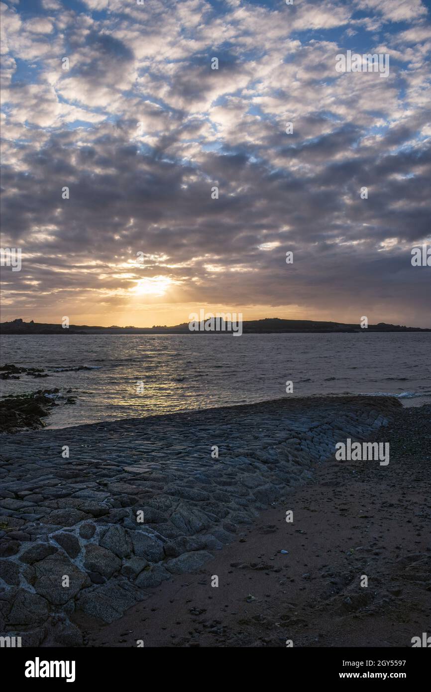 Lihou Island at sunset from L'Erée Headland, Guernsey, Channel Islands Stock Photo