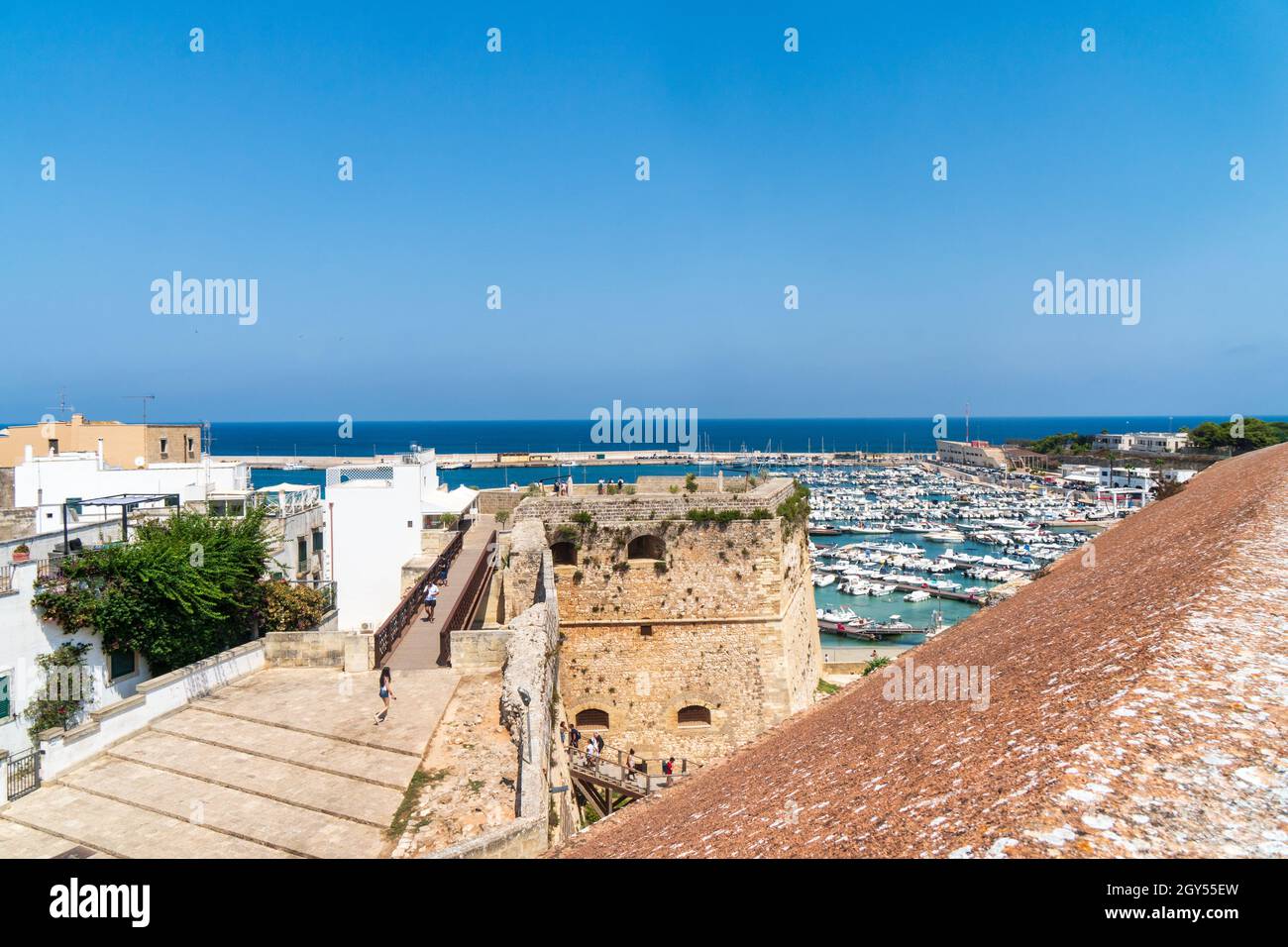 Otranto, Apulia, Italy - August, 17, 2021: view of the harbor from the Aragonese castle of Otranto Stock Photo
