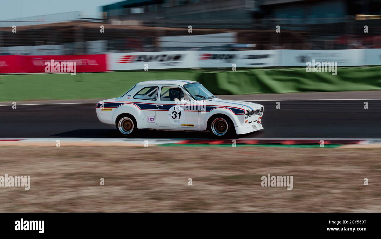 Italy, september 11 2021. Vallelunga classic. 70s vintage car racing blurred motion background of Ford Escort RS1600 on asphalt racetrack Stock Photo