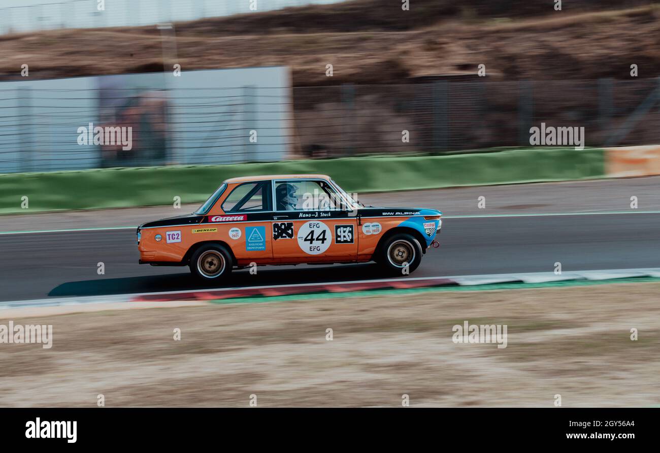 Italy, september 11 2021. Vallelunga classic. 70s vintage car racing blurred motion background of BMW 2002 TI on asphalt racetrack Stock Photo