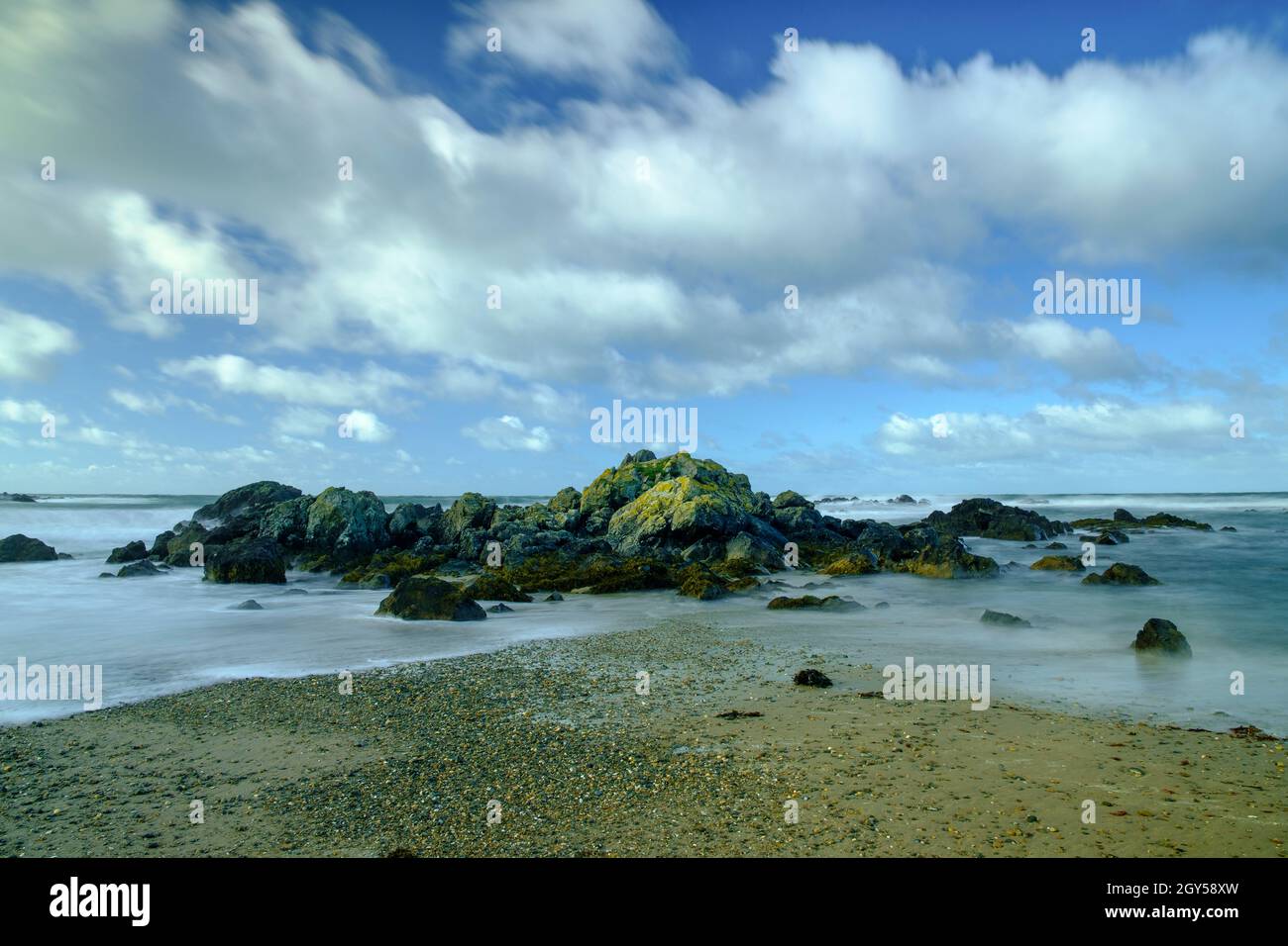 The retreating tide at Rhosneigr beach on Anglesey, North Wales, UK Stock Photo