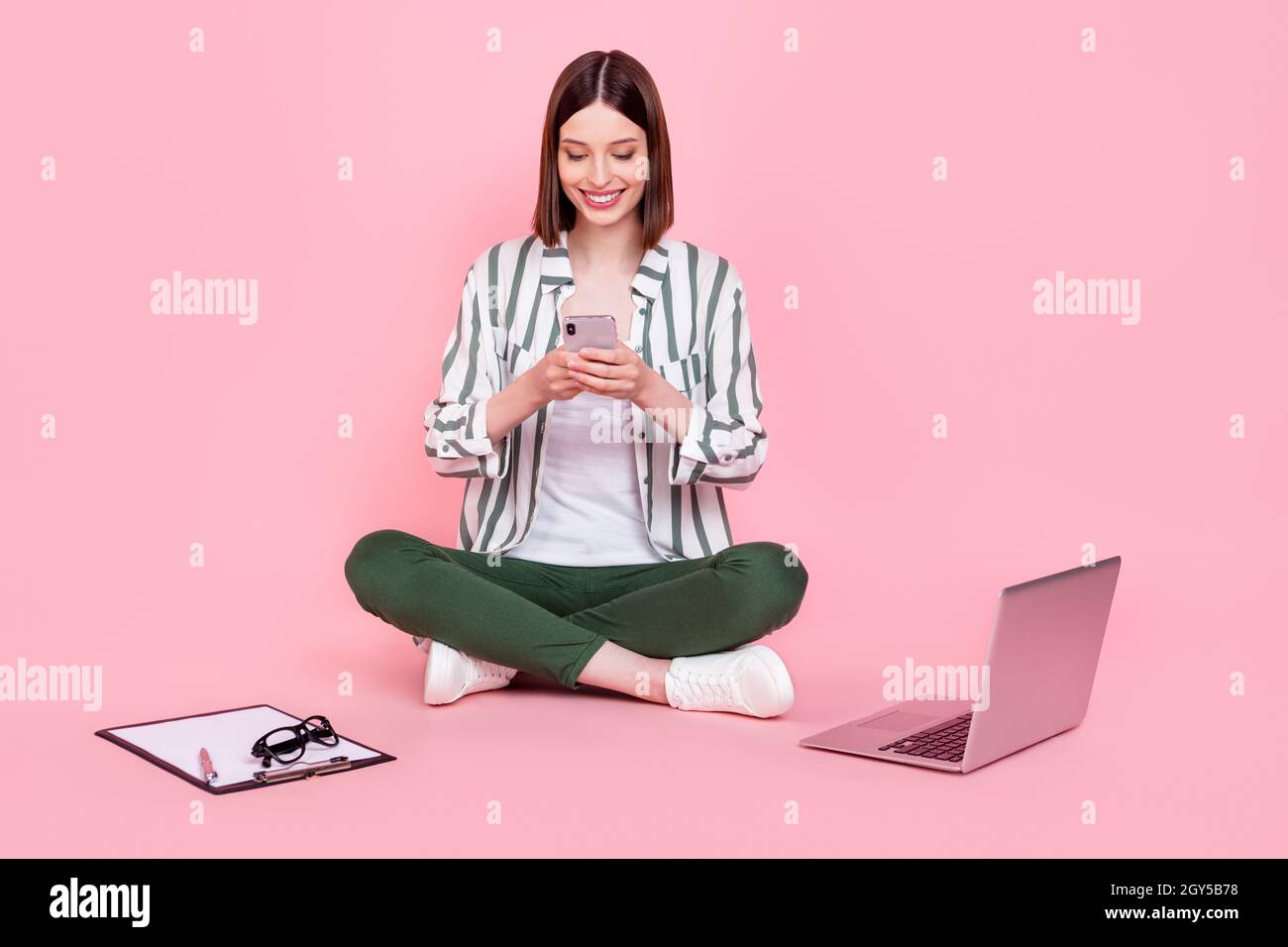 Full size photo of young girl happy positive smile chat type cellphone