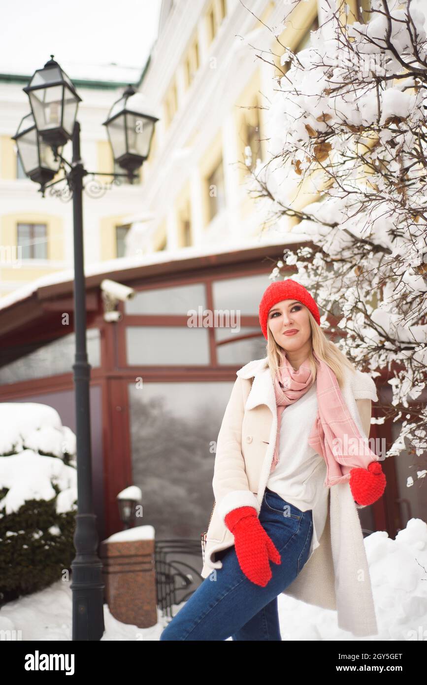 Young beautiful girl outdoors in the winter city Stock Photo - Alamy