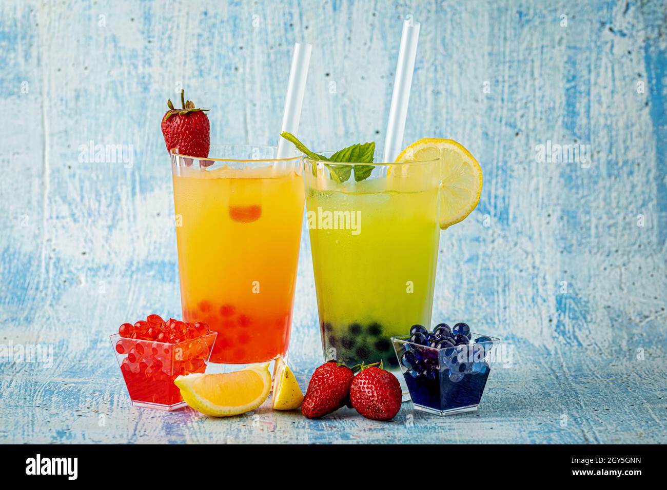 Lemonade with bubble tea on blue stone background Stock Photo Alamy