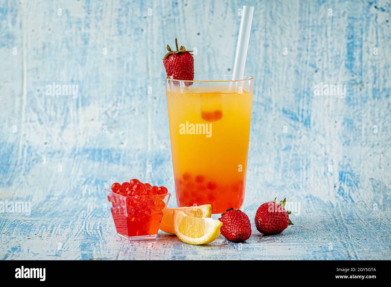Lemonade with bubble tea on blue stone background Stock Photo Alamy