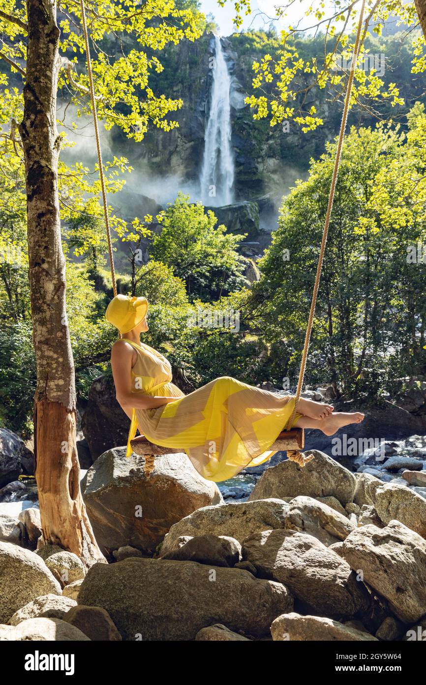 Girl with a yellow dress in the nature Stock Photo