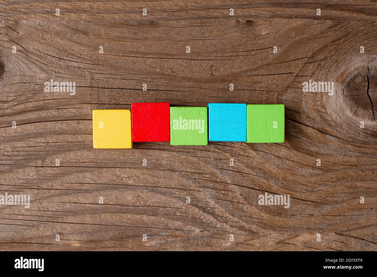 Stack of Sample Cube Rectangular Boxes On Surface Polished With Multi-Colour Stock Photo