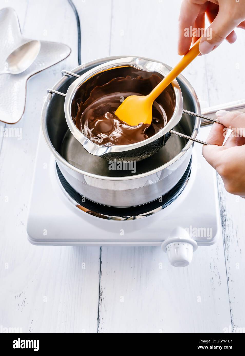 Double boiler hi-res stock photography and images - Alamy