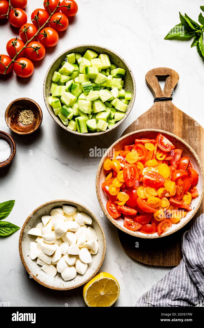 A Healthy Cucumber Tomato Mozzarella Salad Stock Photo Alamy