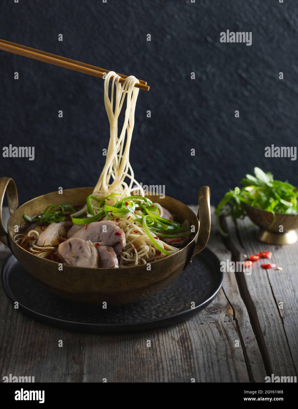 Pork Hock and Trotter served with noodles, with chop sticks Stock Photo