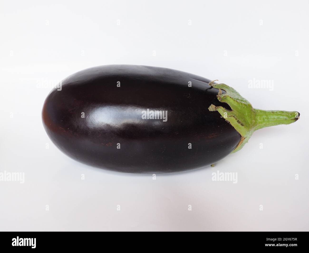aubergine (scientific name Solanum melongena aka egg plant or melongene or  garden egg) vegetables vegetarian food Stock Photo - Alamy