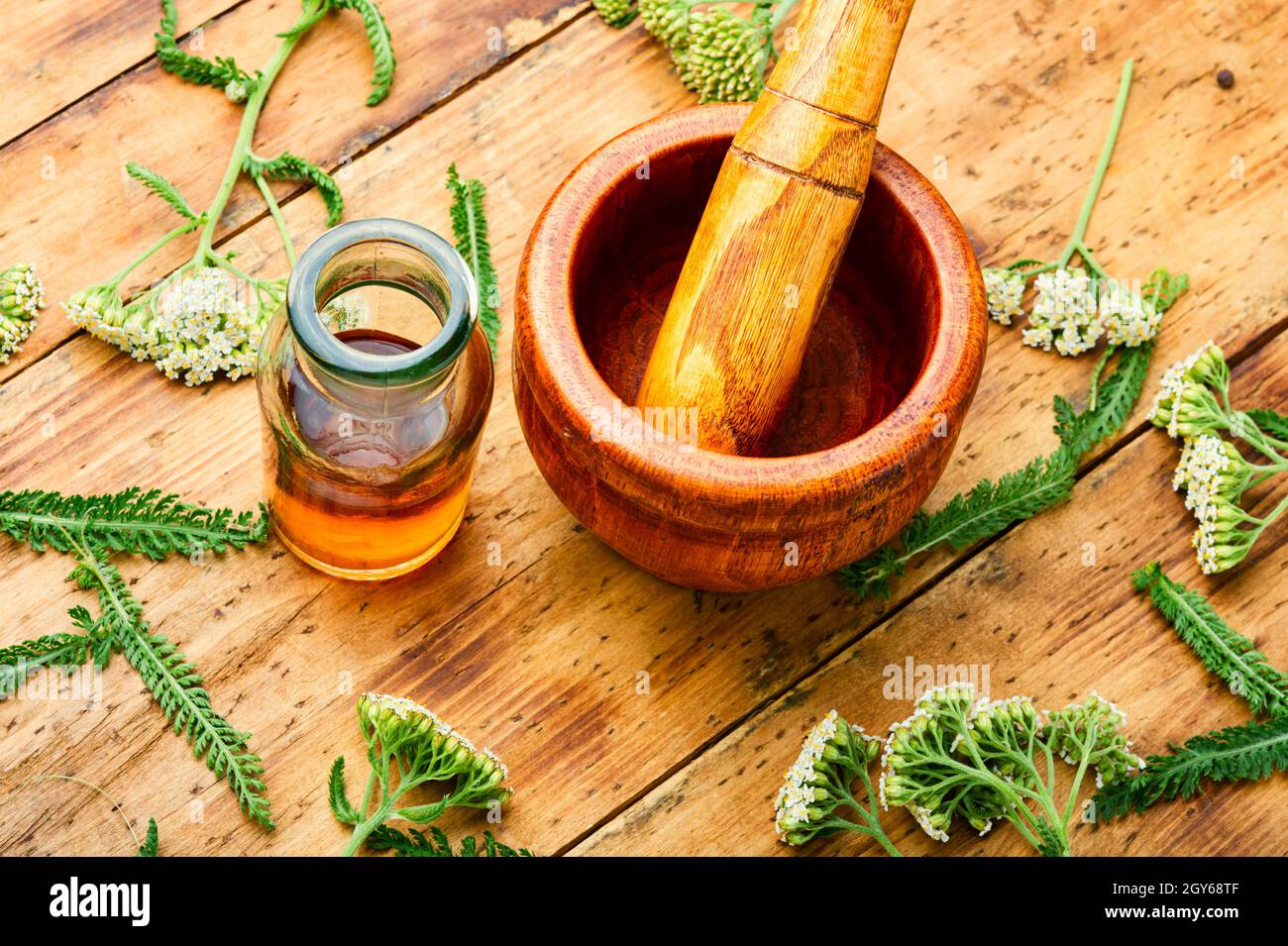 Jar of yarrow tincture.Medicine made from medicinal herbs.Herbalism and
