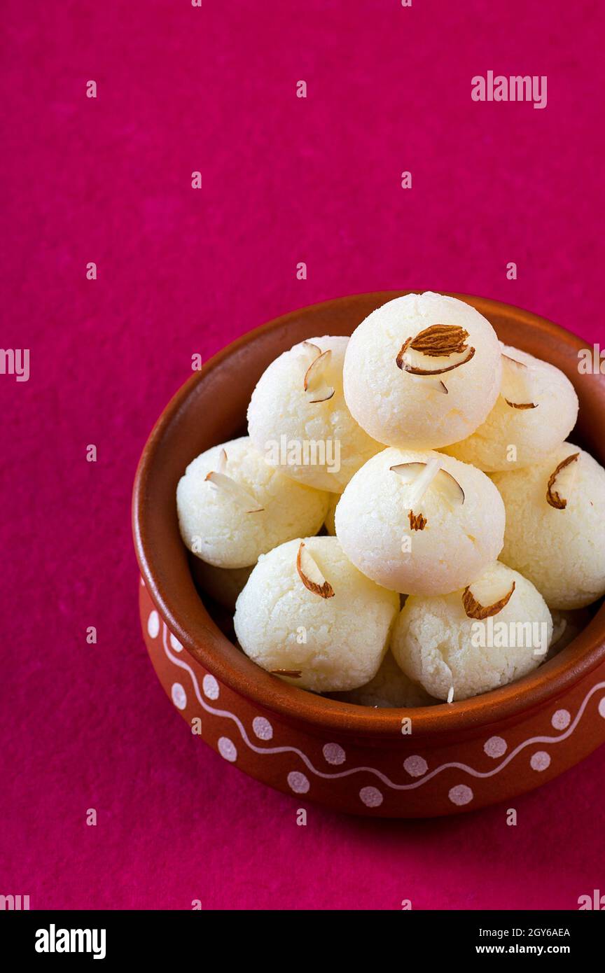 Indian Sweet or Dessert - Rasgulla, Famous Bengali sweet in clay bowl ...