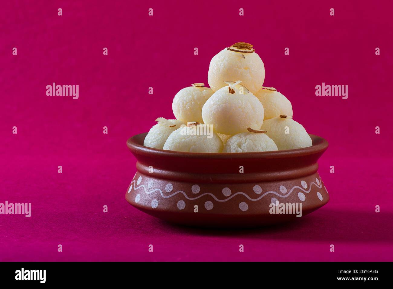 Indian Sweet or Dessert - Rasgulla, Famous Bengali sweet in clay bowl ...