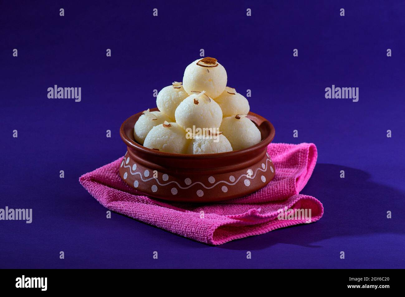 Indian Sweet or Dessert - Rasgulla, Famous Bengali sweet in clay bowl ...