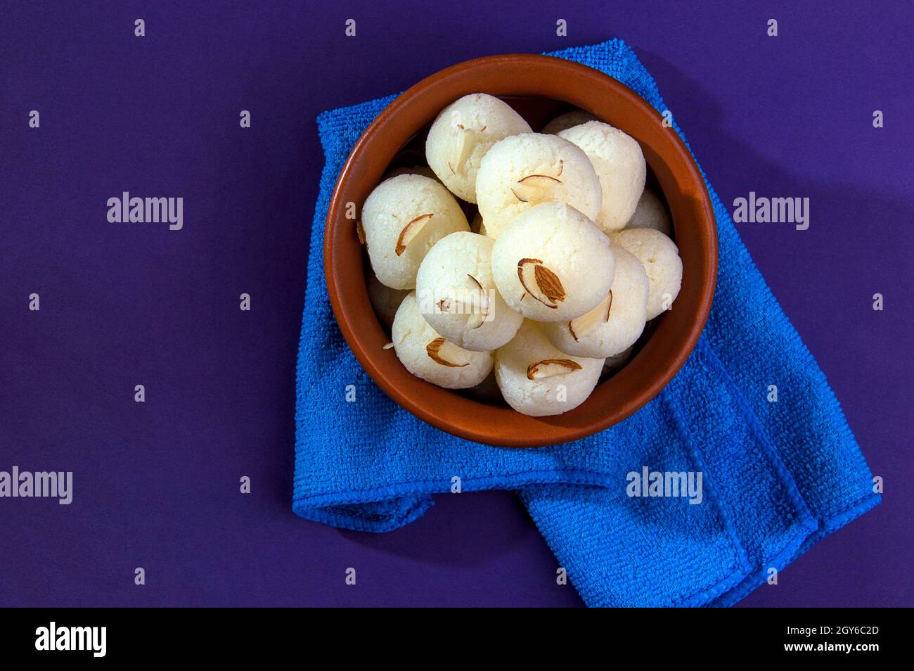 Indian Sweet or Dessert - Rasgulla, Famous Bengali sweet in clay bowl ...